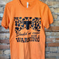 With A Warning Graphic Tee
